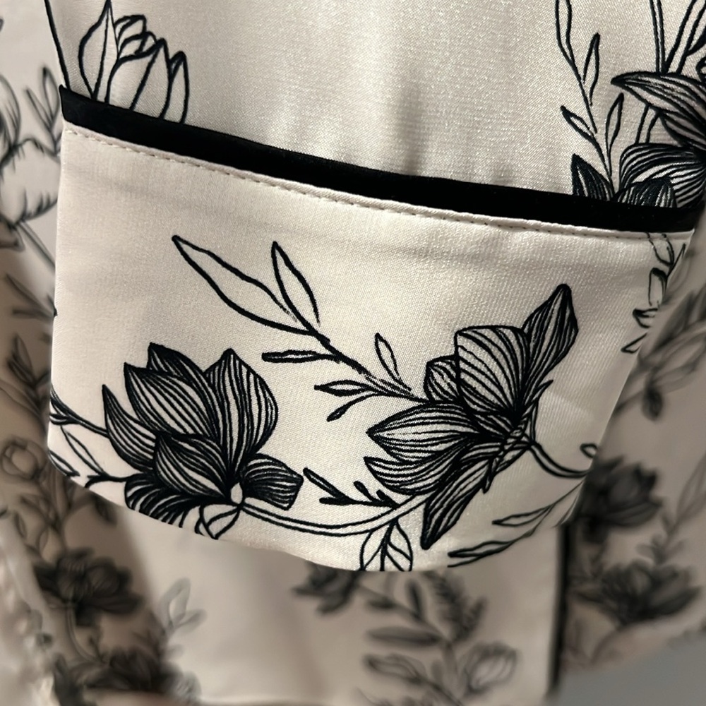 La Ligne NYC 100% Silk gorgeous button up blouse. Beautiful floral design.